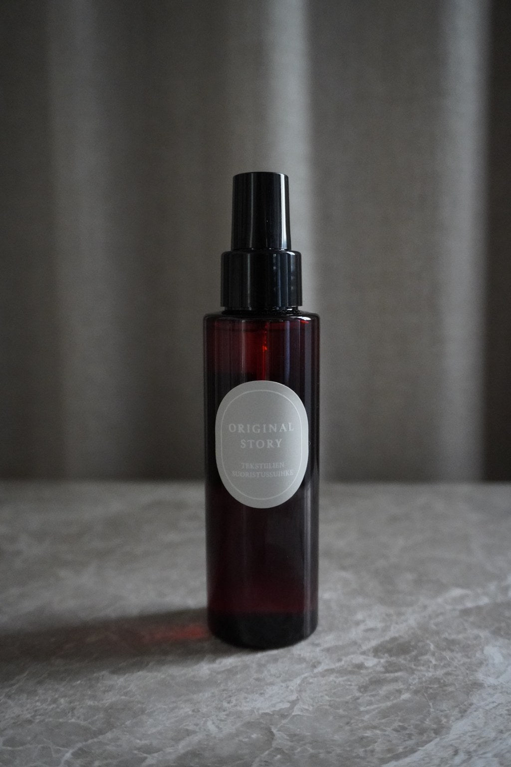 Tekstiilien suoristussuihke